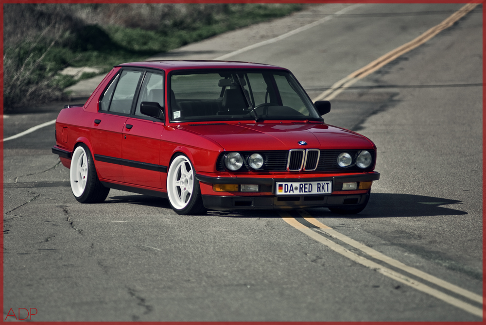 Ready to ride with a tough stance is this bright red E28